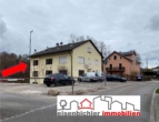 Ansicht mit Logo - Sanierte, helle Stadtwohnung im ersten OG, mit Keller und KFZ-Stellplatz für bis zu 2 Autos!