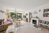 Wohnzimmer - Zwei zusammengelegte Erdgeschosswohnungen mit Garten, Terrasse, Garage und Außenstellplatz